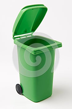 Green Recycling Bin On White Background photo