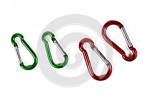 Green and red carabiner snap hooks on white background