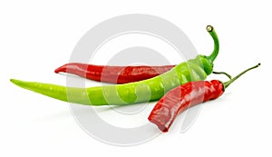 Green and Red Chili Peppers Isolated on White