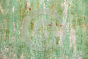 Green and red orange metal Abstract old textured background. Craquelure. Rough craquelure texture