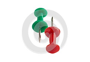 Green and red push pins isolated on white background.