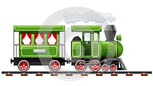 Green retro locomotive with coach