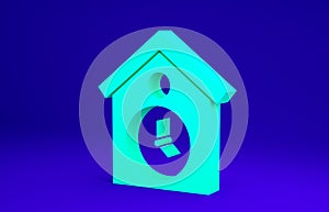 Green Retro wall watch icon isolated on blue background. Cuckoo clock sign. Antique pendulum clock. Minimalism concept