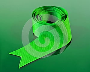 A coiled green ribbon.