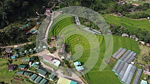 Green rice fields between mountains with Mae Klang Luang village On Doi Inthanon Chiang Mai Northern Thailand Asia