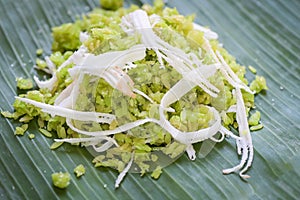 Green rice sweet with ears of rice pandan leaf, Thai dessert - pounded unripe rice food rice flakes cereal with coconut and sugar
