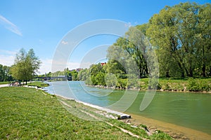 Green riverscape at isar river, recreational area munich city photo