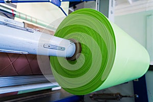 Green roll of polyethylene or polypropylene bags