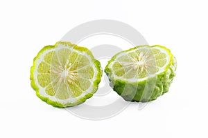 Green rough peel bergamot fruit or kaffir lime isolated on white