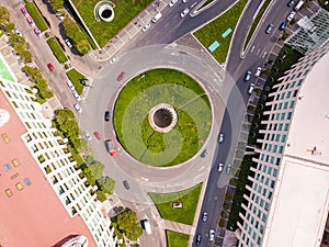 Green roundabout sunny day aerial drone shot