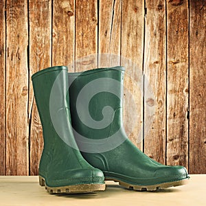 Green rubber boots for garden work