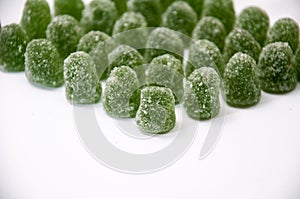 Green rubber menthol candy with sugar