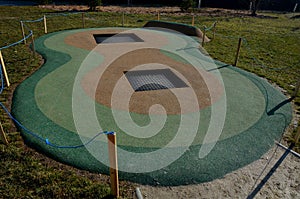 green rubber surfaces are soft and safe in all weathers.