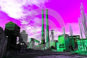 Green rusty pipes and factory emitting radiation produce smog into the bright poisonous purple sky, the concept of pollution and