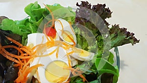 Green salad and boiled eggs