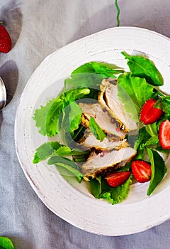 Green salad with chicken and strawberry