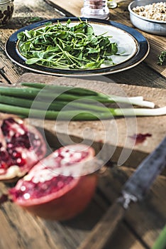 Green salad with pomegranate, manna croup, onion