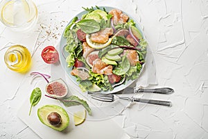 Green salad with smoked salmon and avocado