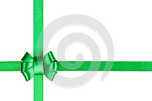 Green satin ribbon tied in a bow isolated on white