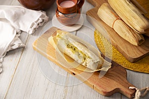 green sauce tamale and atole