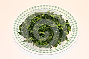 Green Sauteed Spinach On Plate