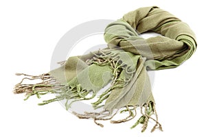 Green scarf with tassels on white background.