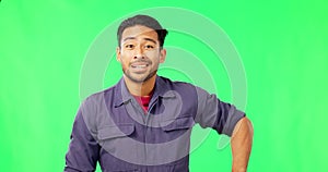 Green screen, sweat and portrait of a happy handyman remove cap or hat isolated in a studio background. Smile