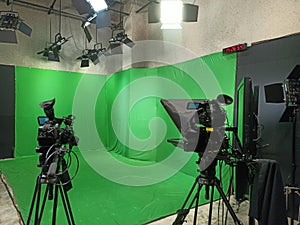 Green screen and teleprompter in studio