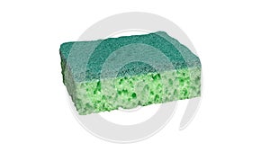 Green scrubber for washing dishes, kitchen sponge isolated on white background.