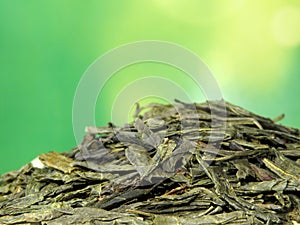 Green Sencha tea leaves closeup