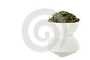 Green sencha tea in white cup