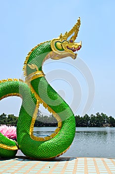 Green Serpent statue in temple Thailand