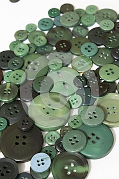 Green sewing buttons background