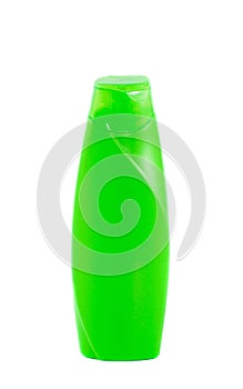 Green shampoo bottle isolated on white