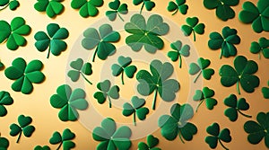 Green shamrocks scattered across a golden background with glow photo