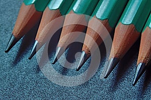Green sharpened wooden pencils
