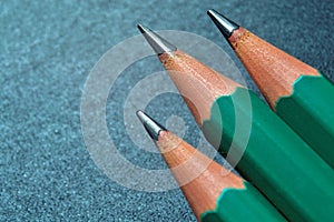 Green sharpened wooden pencils