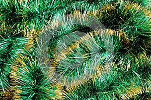 Green shiny christmas tinsel texture for decoration