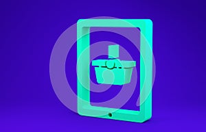 Green Shopping basket on screen tablet icon isolated on blue background. Concept e-commerce, e-business, online business