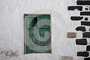 Green shutter window, white house, Spain