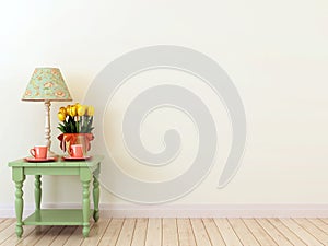 Green side table with the decor in the interior