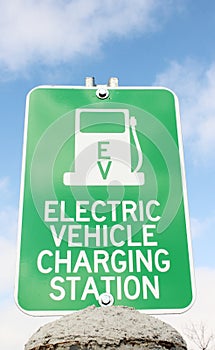 Green sign for electric vehicle charging station