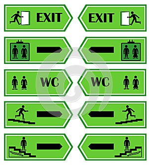 Green signs direction to the exit