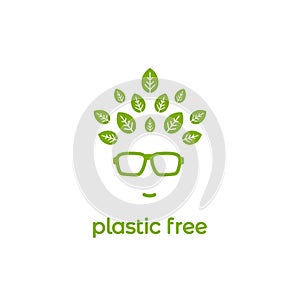 Green silhouette of man`s head in hipster glasses with leaves in hair and text plastic free