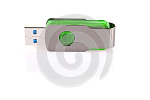 Green and silver USB 3.0 flash drive isolated on white background . USB Pen Drive or flash drive on white background. Close-up.