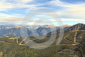 Green ski fields on a summer evening