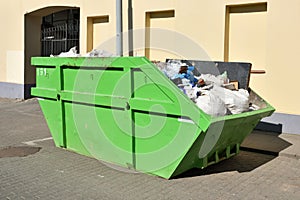 Green skip dumpster for municipal waste