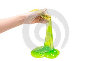 Green slime toy in woman hand isolated on white