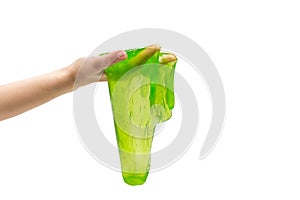 Green slime toy in woman hand isolated on white