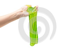 Green slime toy in woman hand isolated on white